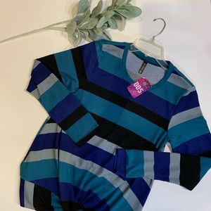 Very cute multicolored top in a sz. S very springy